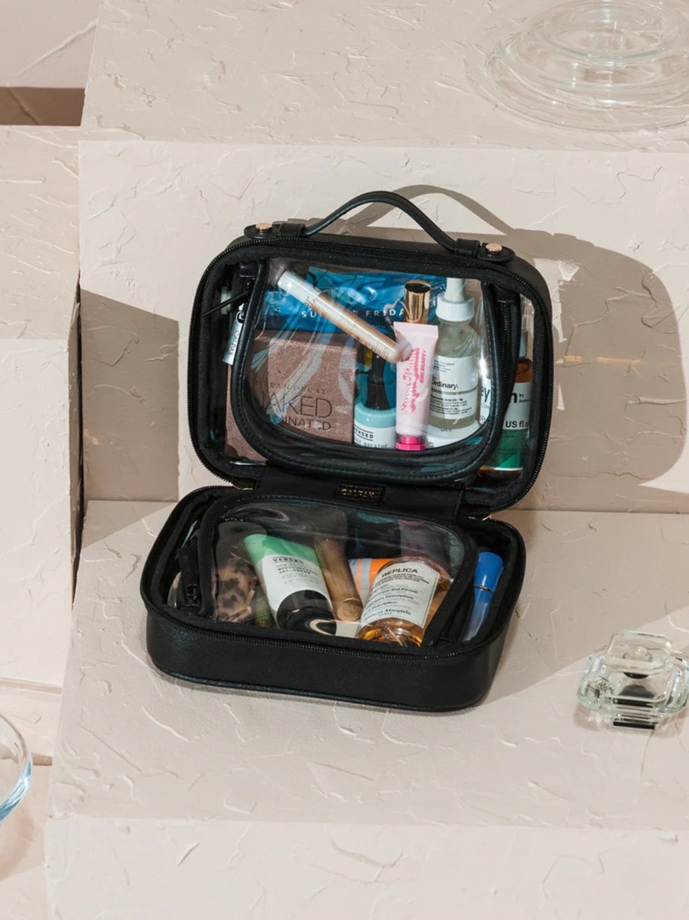 NEW Calpak Small Clear Cosmetics Case in Black new with tags.